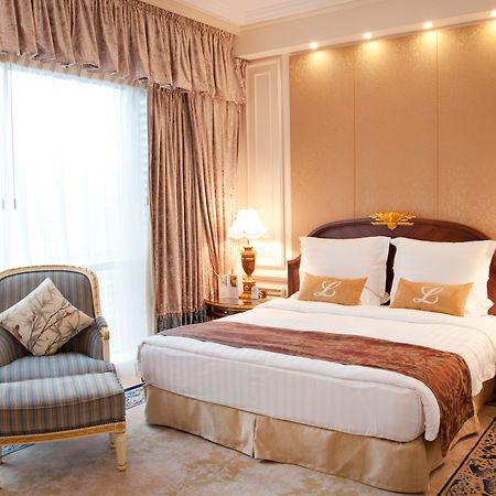 New Orient Landmark Hotel Makaó Kültér fotó A bedroom at the hotel