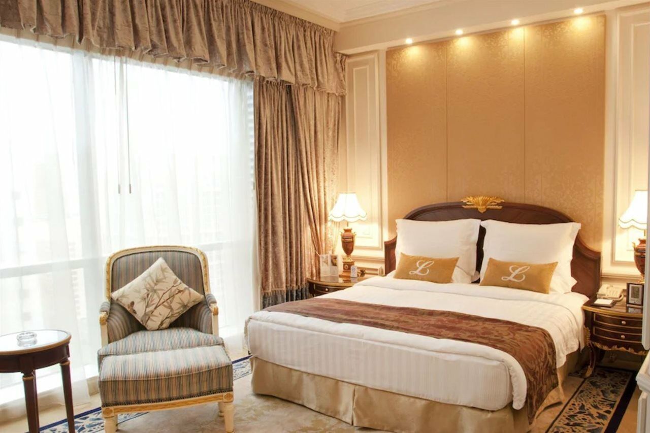 New Orient Landmark Hotel Makaó Kültér fotó A bedroom at the hotel